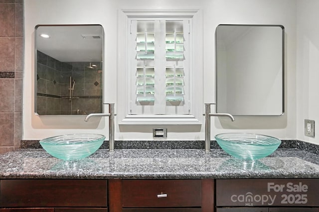 4825 Deanscroft Dr, Charlotte, NC 28226 - full bathroom featuring vanity and a tile shower