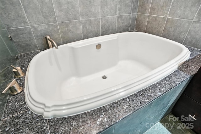 4825 Deanscroft Dr, Charlotte, NC 28226 - full bathroom featuring tile walls and a tub
