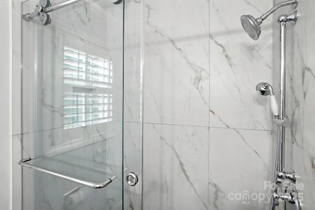4825 Deanscroft Dr, Charlotte, NC 28226 - bathroom featuring a marble finish shower