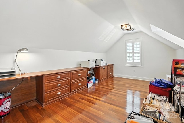 4825 Deanscroft Dr, Charlotte, NC 28226 - home office featuring a skylight, wood finished floors, and vaulted ceiling