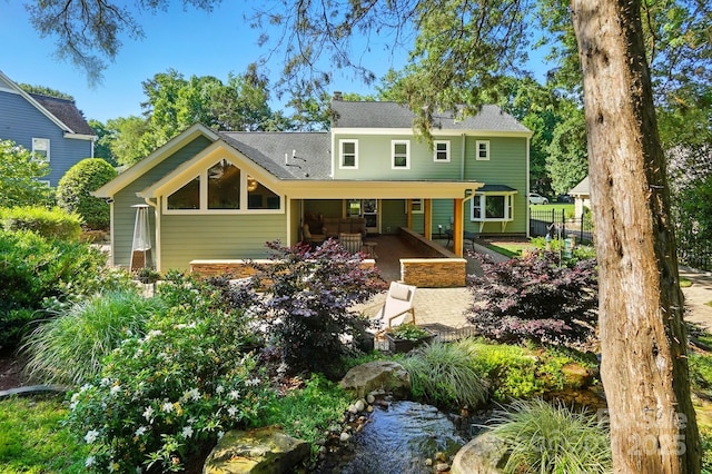 4825 Deanscroft Dr, Charlotte, NC 28226 - view of front of property with a small pond