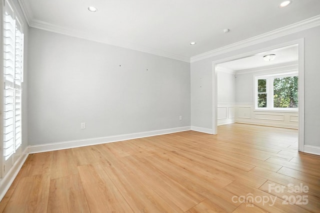 4825 Deanscroft Dr, Charlotte, NC 28226 - spare room featuring light wood finished floors, ornamental molding, and recessed lighting