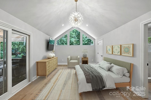 4825 Deanscroft Dr, Charlotte, NC 28226 - bedroom with a chandelier, light wood finished floors, access to exterior, and lofted ceiling
