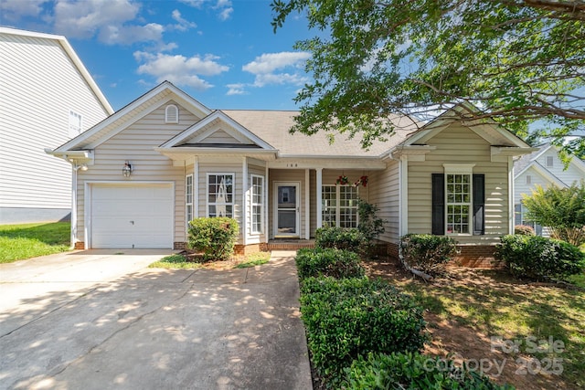 168 Devon Forest Dr, Mooresville, NC 28115 - ranch-style house with an attached garage, driveway, and a porch