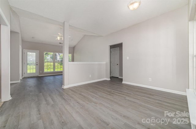 168 Devon Forest Dr, Mooresville, NC 28115 - unfurnished room with wood finished floors, vaulted ceiling, and a ceiling fan