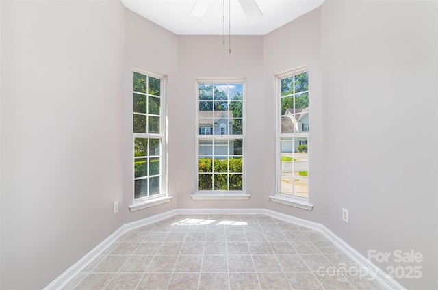 168 Devon Forest Dr, Mooresville, NC 28115 - unfurnished room with light tile patterned flooring and a ceiling fan
