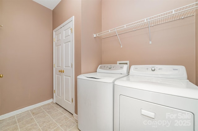 168 Devon Forest Dr, Mooresville, NC 28115 - laundry area with washing machine and dryer and baseboards
