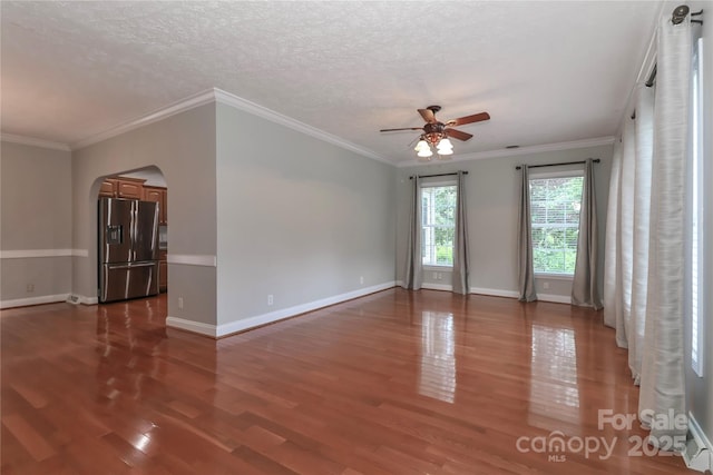 5890 Alley Rd, Catawba, NC 28609 - unfurnished room featuring a ceiling fan, wood finished floors, arched walkways, crown molding, and a textured ceiling