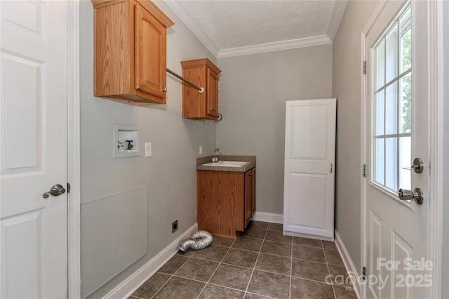 5890 Alley Rd, Catawba, NC 28609 - washroom with cabinet space, hookup for a washing machine, plenty of natural light, ornamental molding, and dark tile patterned floors