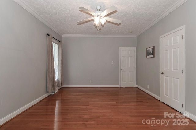 5890 Alley Rd, Catawba, NC 28609 - spare room with ceiling fan, wood finished floors, a textured ceiling, and ornamental molding