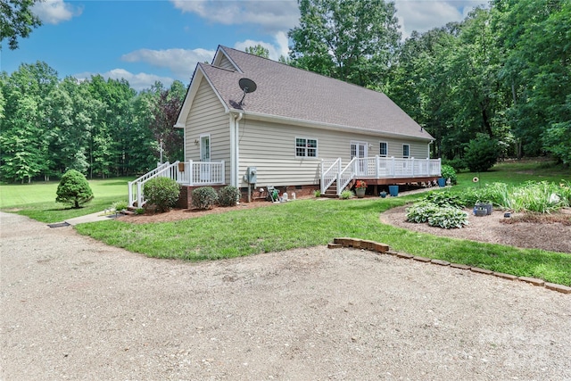 5890 Alley Rd, Catawba, NC 28609 - view of side of home featuring stairway, a deck, a yard, and a shingled roof