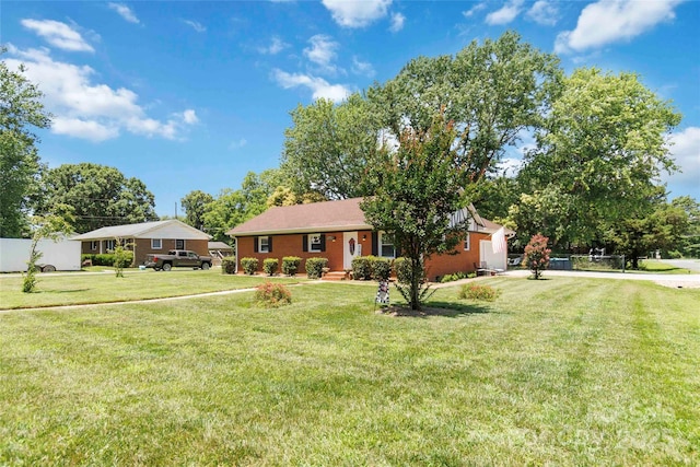 1219 Flowe Dr, Matthews, NC 28104 - ranch-style house with a front yard