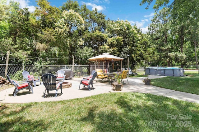 1219 Flowe Dr, Matthews, NC 28104 - view of patio / terrace with a gazebo and an outdoor fire pit