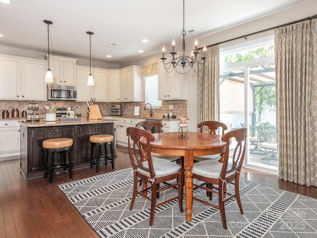 1109 Saratoga Blvd, Indian Trail, NC 28079 - dining space featuring a chandelier, healthy amount of natural light, dark wood-style floors, and recessed lighting