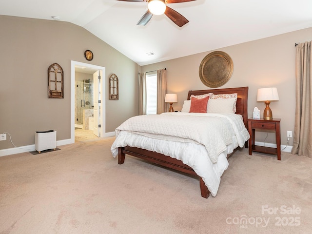 1109 Saratoga Blvd, Indian Trail, NC 28079 - bedroom featuring light colored carpet, lofted ceiling, ceiling fan, and connected bathroom