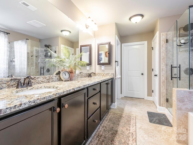 1109 Saratoga Blvd, Indian Trail, NC 28079 - full bath featuring a shower stall and double vanity