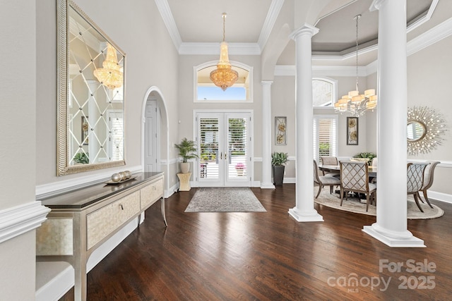 3394 Governors Island Dr, Denver, NC 28037 - foyer entrance with a chandelier, crown molding, ornate columns, wood finished floors, and french doors