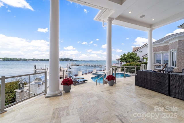 3394 Governors Island Dr, Denver, NC 28037 - view of patio / terrace with a water view and a pool with connected hot tub