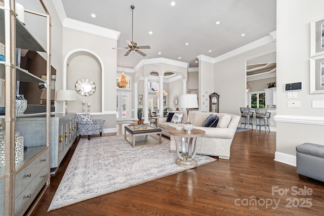 3394 Governors Island Dr, Denver, NC 28037 - living room with a ceiling fan, ornamental molding, dark wood-style floors, recessed lighting, and a towering ceiling