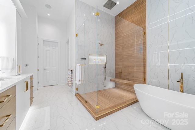 3394 Governors Island Dr, Denver, NC 28037 - full bath featuring a marble finish shower, marble finish floors, a freestanding tub, vanity, and recessed lighting