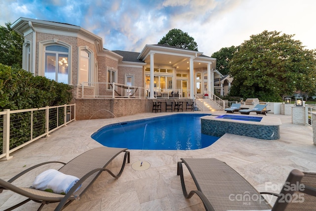 3394 Governors Island Dr, Denver, NC 28037 - view of swimming pool featuring a patio and a pool with connected hot tub