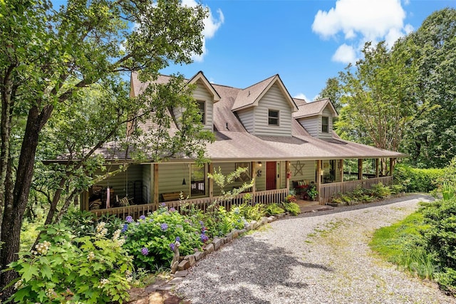 62 Skyline Dr Unit 509-510, Old Fort, NC 28762 - country-style home with a porch, gravel driveway, and a shingled roof