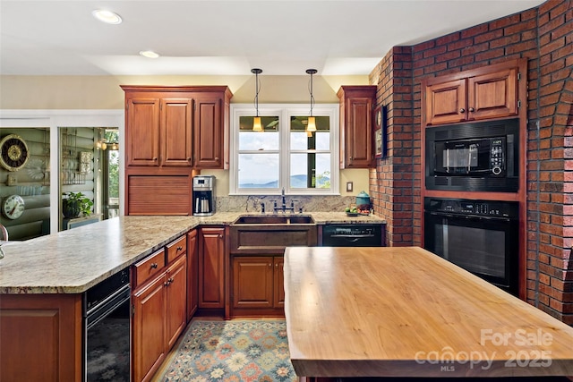 62 Skyline Dr Unit 509-510, Old Fort, NC 28762 - kitchen with black appliances, butcher block countertops, a peninsula, hanging light fixtures, and a kitchen island