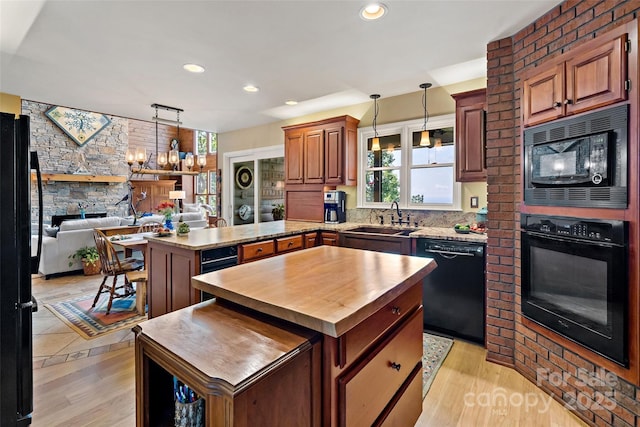 62 Skyline Dr Unit 509-510, Old Fort, NC 28762 - kitchen with black appliances, wooden counters, a peninsula, plenty of natural light, and recessed lighting
