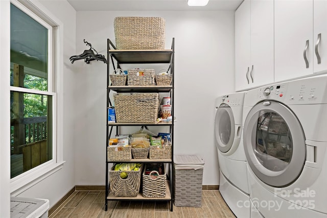 62 Skyline Dr Unit 509-510, Old Fort, NC 28762 - laundry area with cabinet space, wood tiled floors, and independent washer and dryer