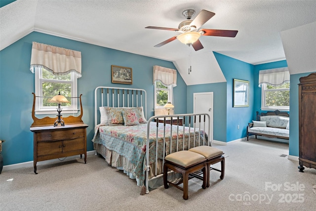 62 Skyline Dr Unit 509-510, Old Fort, NC 28762 - carpeted bedroom with vaulted ceiling, a textured ceiling, and a ceiling fan