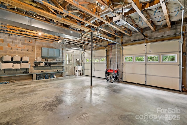 62 Skyline Dr Unit 509-510, Old Fort, NC 28762 - garage featuring concrete block wall and a garage door opener