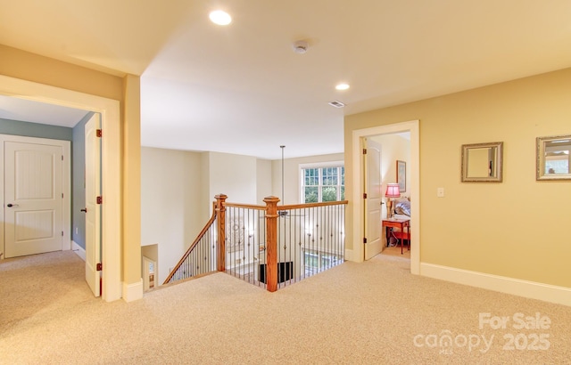 35 Village Pointe Ln, Asheville, NC 28803 - hallway featuring carpet floors, an upstairs landing, and recessed lighting