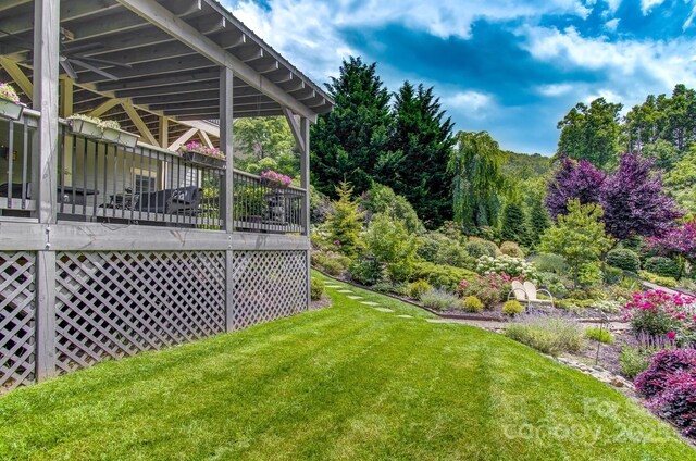 35 Village Pointe Ln, Asheville, NC 28803 - view of grassy yard featuring a deck