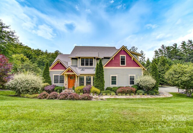 35 Village Pointe Ln, Asheville, NC 28803 - craftsman inspired home with a front lawn, stone siding, and a shingled roof