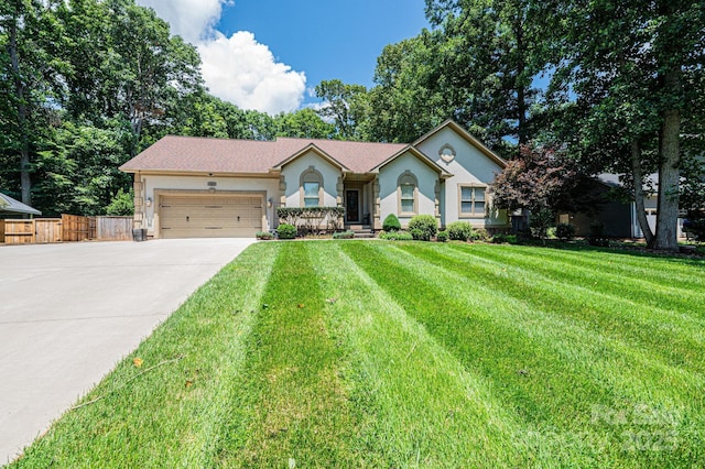 3889 Mattingly Dr, Hickory, NC 28602 - ranch-style house with stucco siding, driveway, and a garage