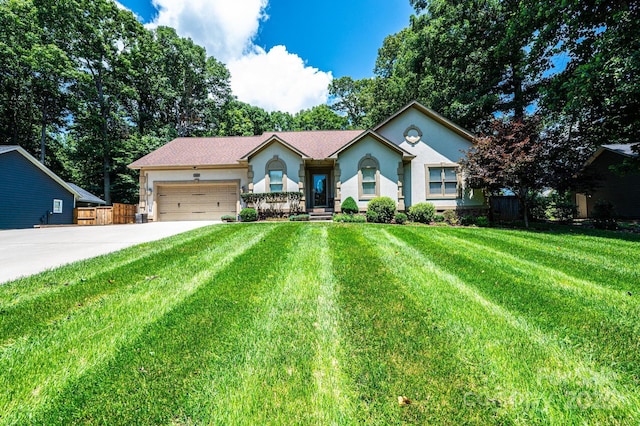 3889 Mattingly Dr, Hickory, NC 28602 - ranch-style house with stucco siding, driveway, and a garage