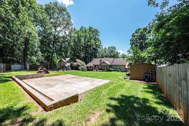 3889 Mattingly Dr, Hickory, NC 28602 - fenced backyard with a playground and a storage unit