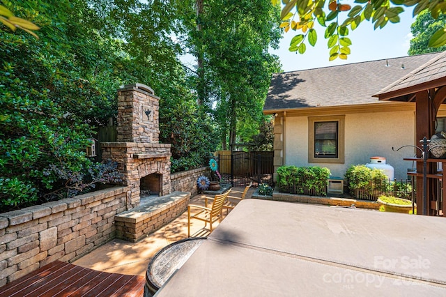 3889 Mattingly Dr, Hickory, NC 28602 - view of patio featuring an outdoor stone fireplace