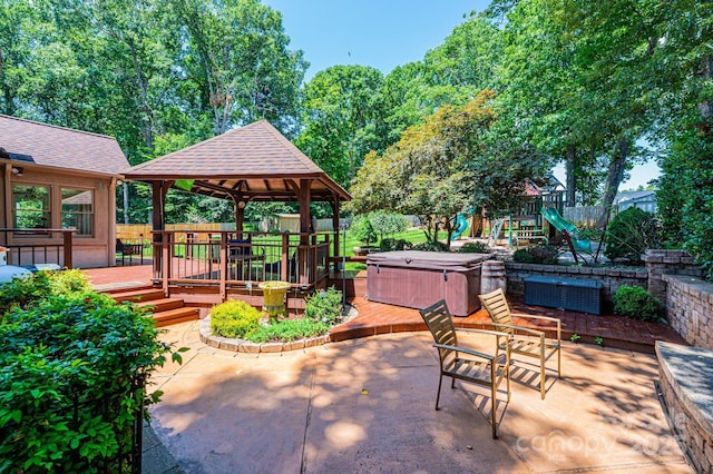 3889 Mattingly Dr, Hickory, NC 28602 - view of patio / terrace featuring a hot tub, a gazebo, a wooden deck, and a playground