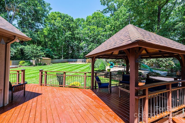 3889 Mattingly Dr, Hickory, NC 28602 - wooden deck with a gazebo, a fenced backyard, a shed, and view of wooded area