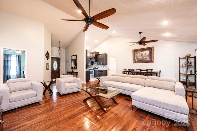3889 Mattingly Dr, Hickory, NC 28602 - living area with ceiling fan, dark wood-type flooring, high vaulted ceiling, and recessed lighting
