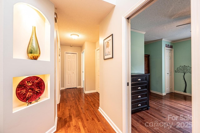 3889 Mattingly Dr, Hickory, NC 28602 - hallway featuring wood finished floors and a textured ceiling