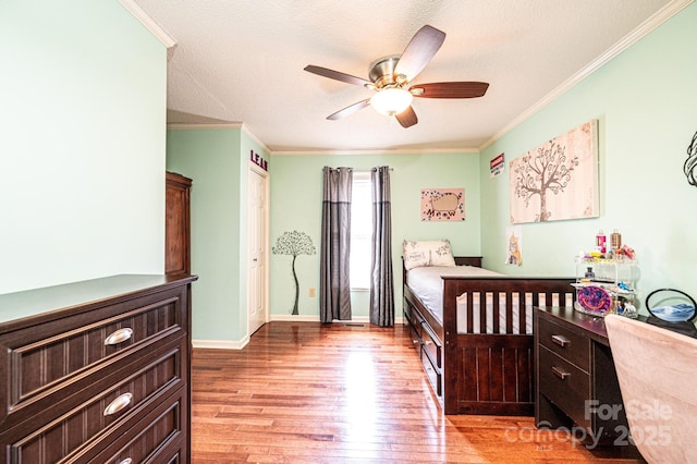 3889 Mattingly Dr, Hickory, NC 28602 - bedroom featuring wood finished floors, ornamental molding, and a ceiling fan