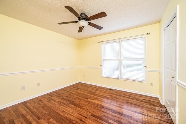 3889 Mattingly Dr, Hickory, NC 28602 - unfurnished room with wood finished floors, a ceiling fan, and a textured ceiling