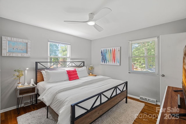 21212 Rio Oro Dr, Cornelius, NC 28031 - bedroom with wood finished floors and ceiling fan