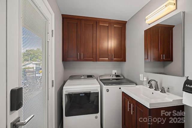 21212 Rio Oro Dr, Cornelius, NC 28031 - laundry area featuring cabinet space and independent washer and dryer