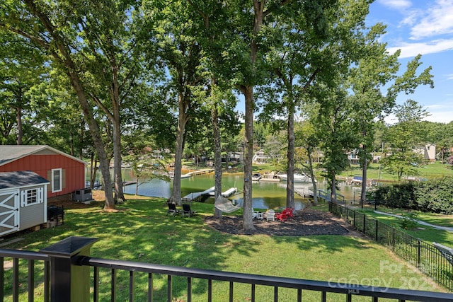 21212 Rio Oro Dr, Cornelius, NC 28031 - view of yard with a water view, a shed, and view of wooded area