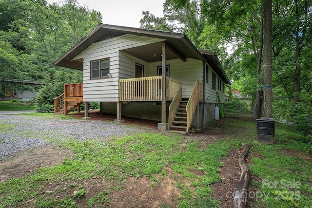 24 Arco Rd, Asheville, NC 28805 - view of front facade featuring stairs and a deck