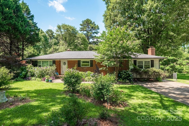 2008 Kimway Dr, Matthews, NC 28105 - single story home featuring a chimney, a front yard, and brick siding
