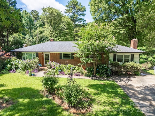 2008 Kimway Dr, Matthews, NC 28105 - single story home with a chimney, a front lawn, and brick siding